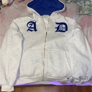 Blue and white sweater With A and D letters in the front!